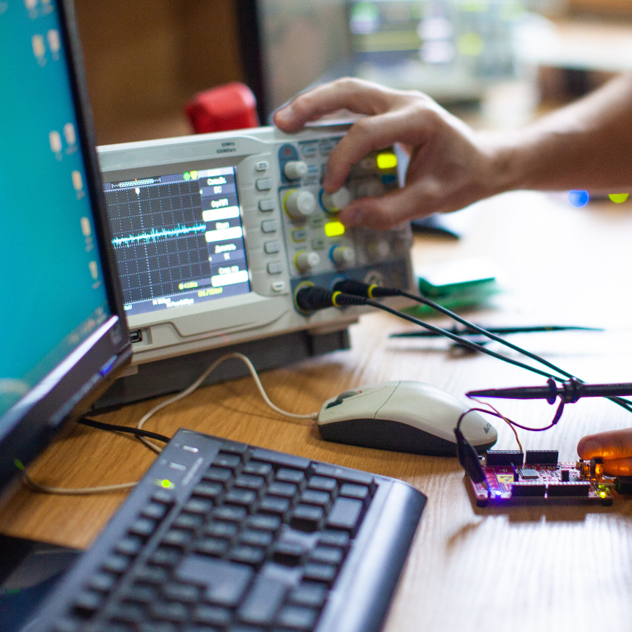 engineers work with electrical measuring devices